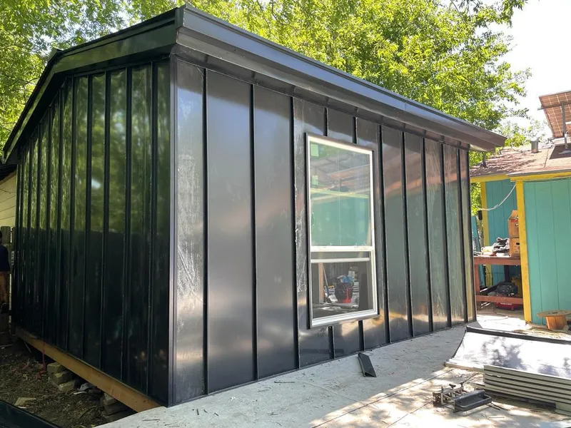 Black standing seam metal wall panels for Roof Inspection in Jurupa Valley