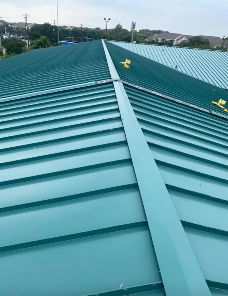 Green commercial metal roof ridge and valley for Metal Roof Repair in Jurupa Valley